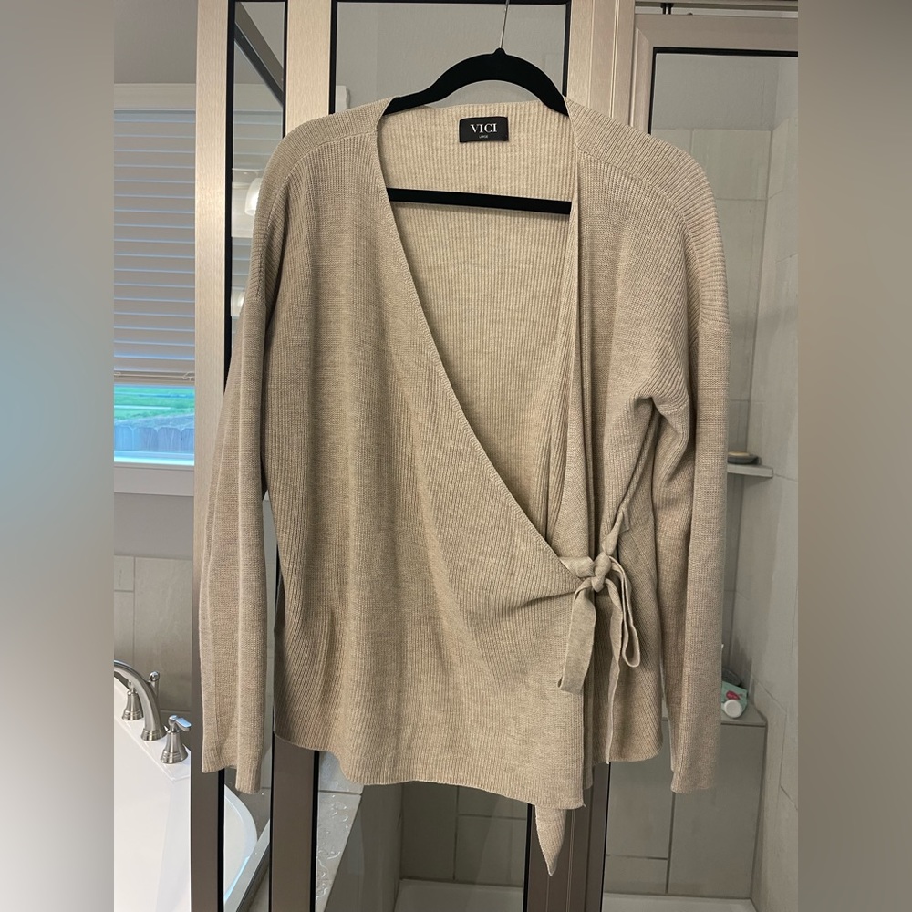 VICI Cross tied long sleeve sweater